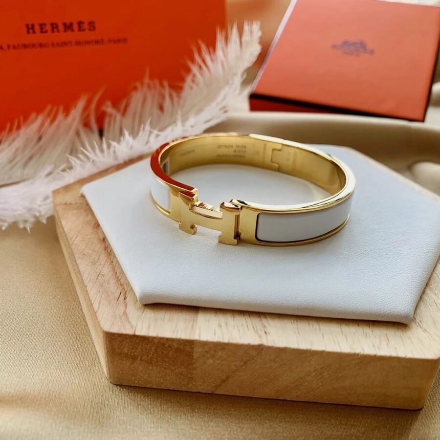 Hermes Bracelet , white Metal with gold hardware