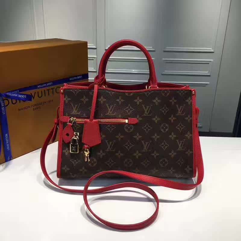 handbag , red leather with monogram