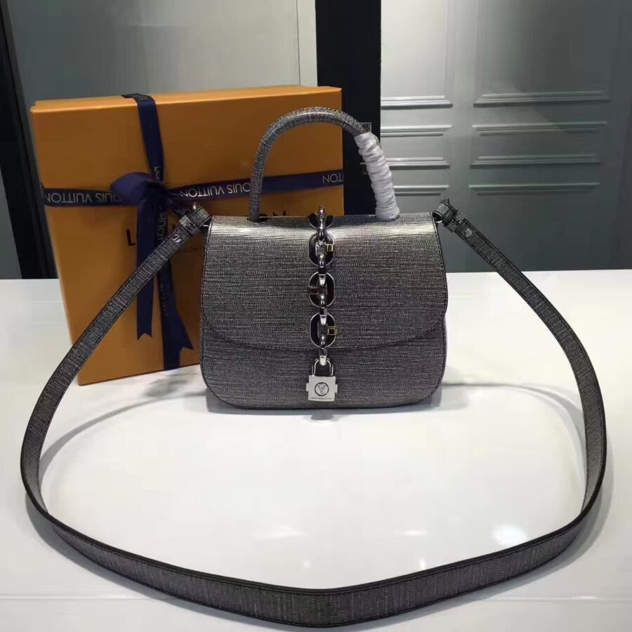 shoulder bag , silver leather with lock me
