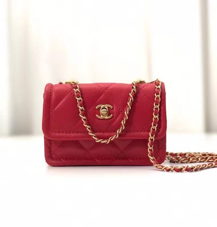 button on top , red leather with flap bag