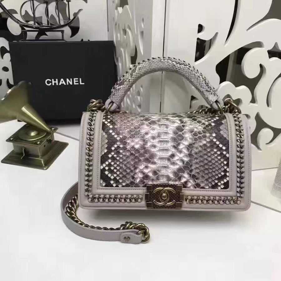 le boy flap shoulder bag , grey snakeskin with chain edging