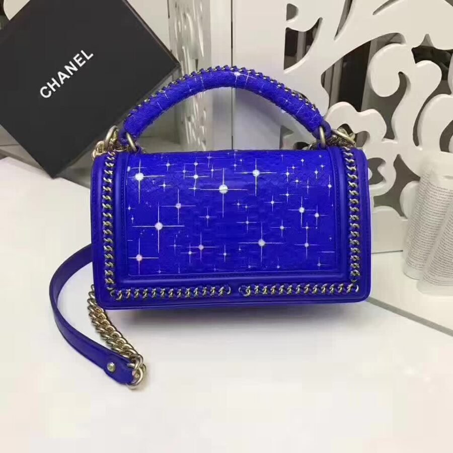 le boy flap shoulder bag , blue snakeskin with bling chain edging