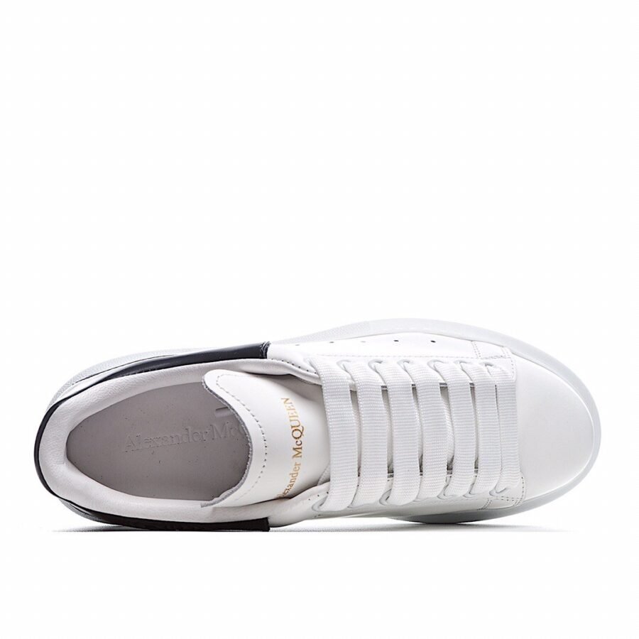 Sneakers , white leather with Black patch